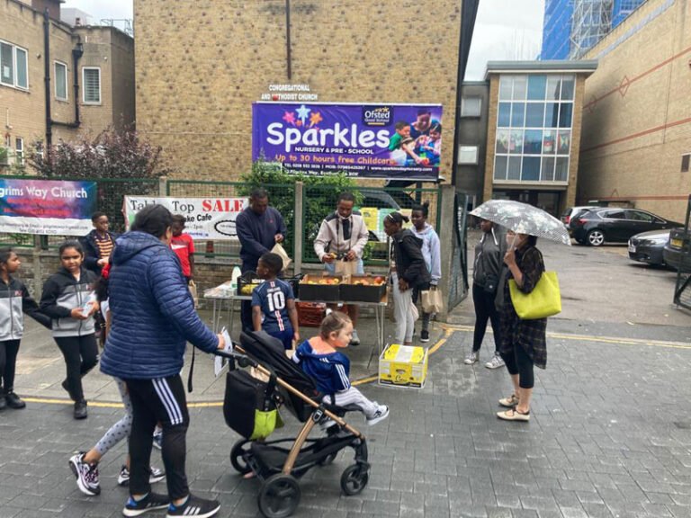 Families arriving for activities outside the community venue